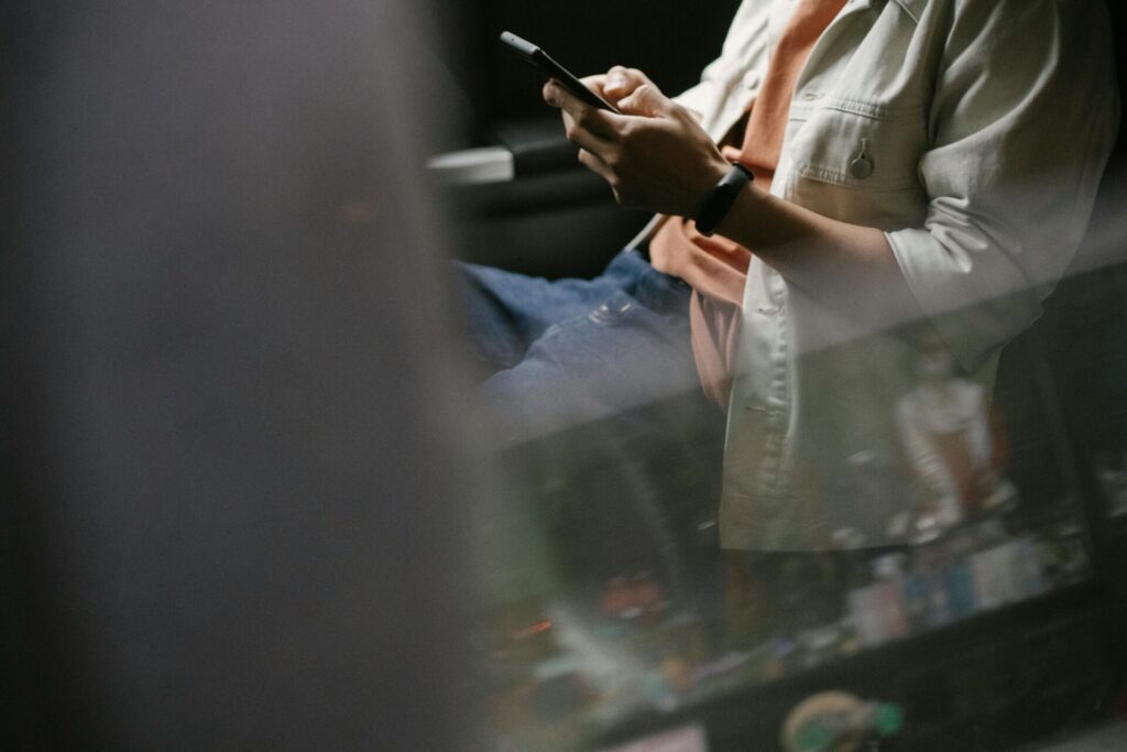 man on phone in car